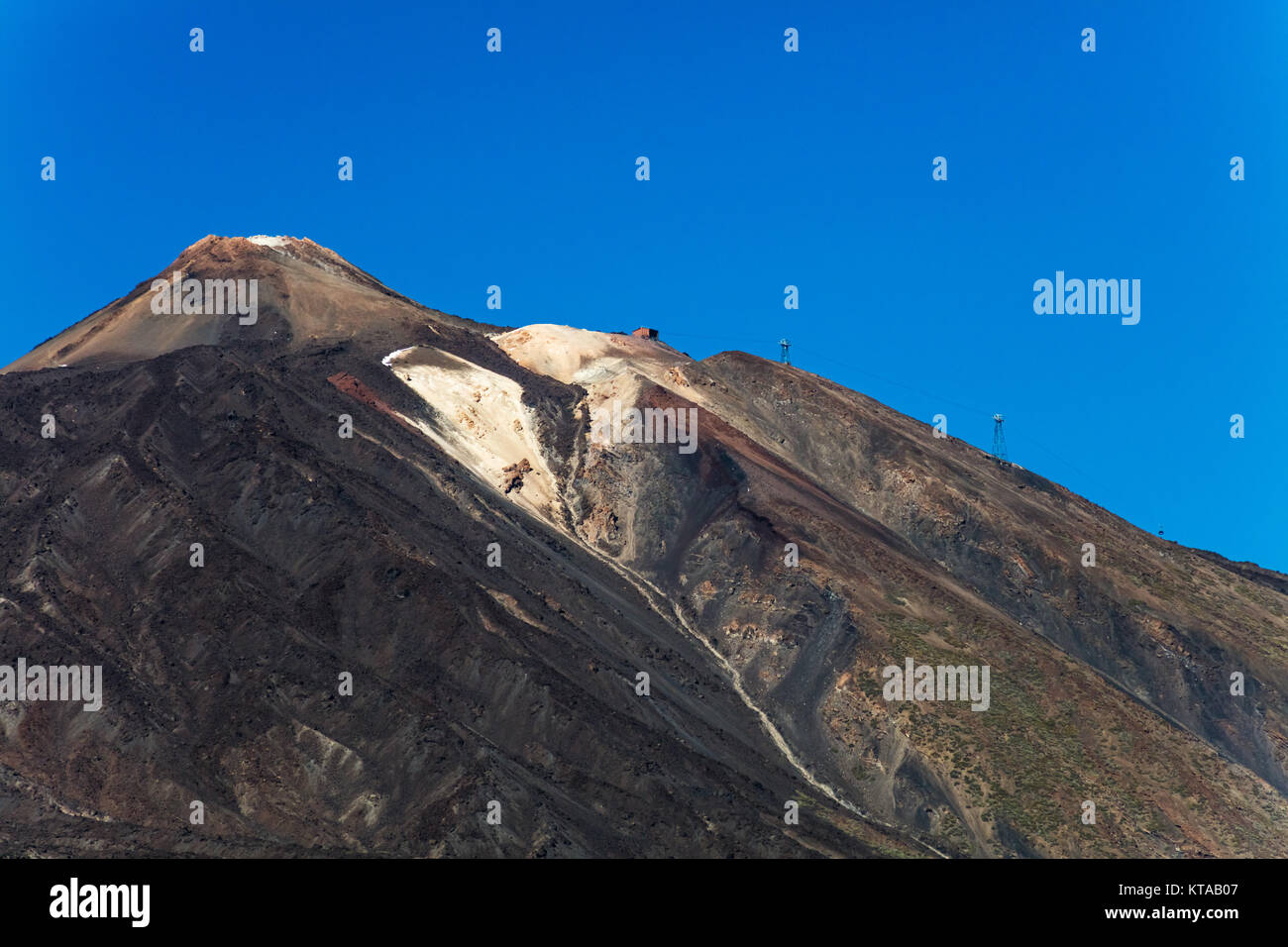 An uphill view of `Pico del Teide', the colourful Teide volcano in Teide National Park, Tenerife, Canary Islands. Stock Photo